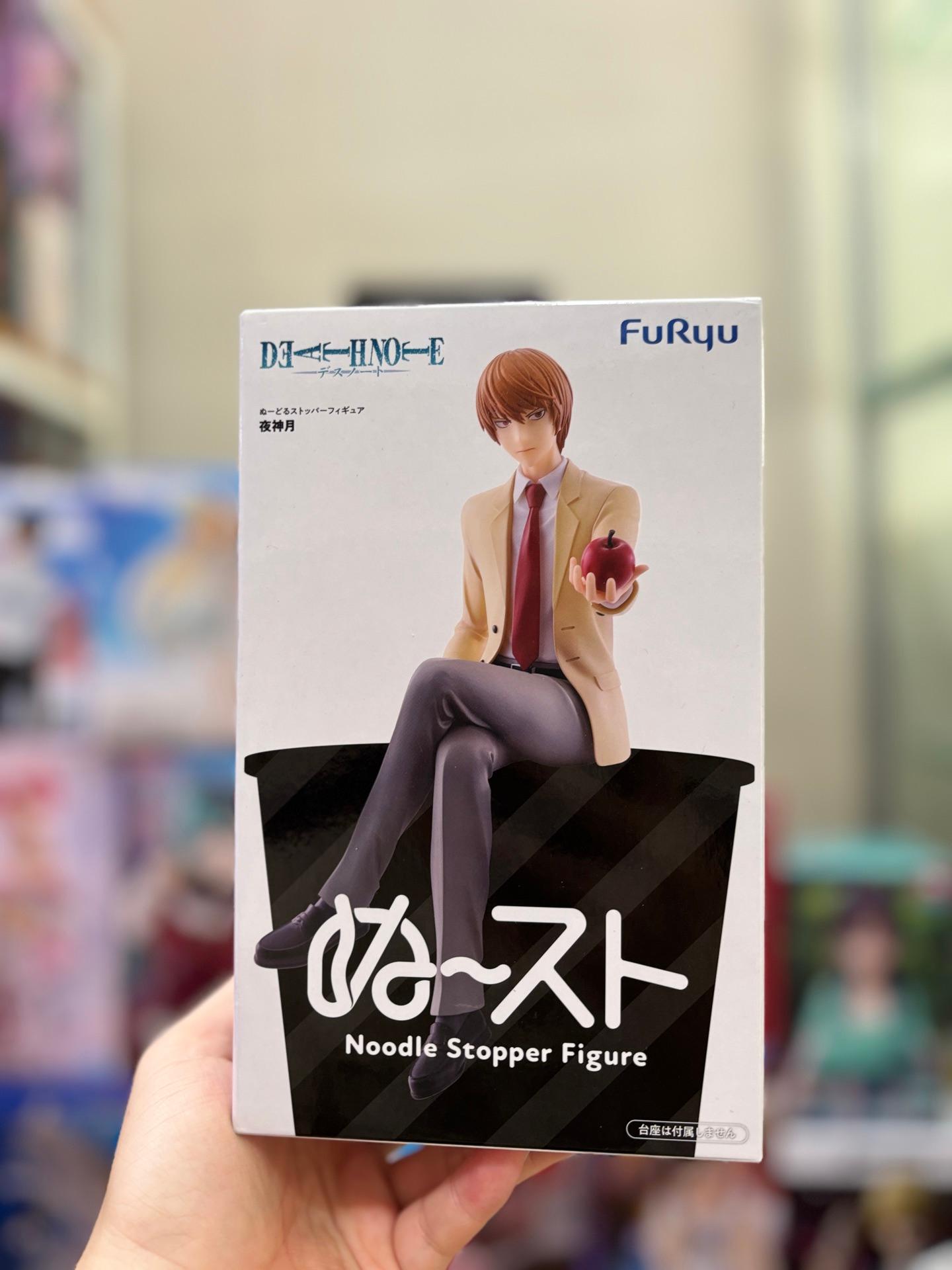 FuRyu Death Note Noodle Stopper Figure featuring Light Yagami holding an apple