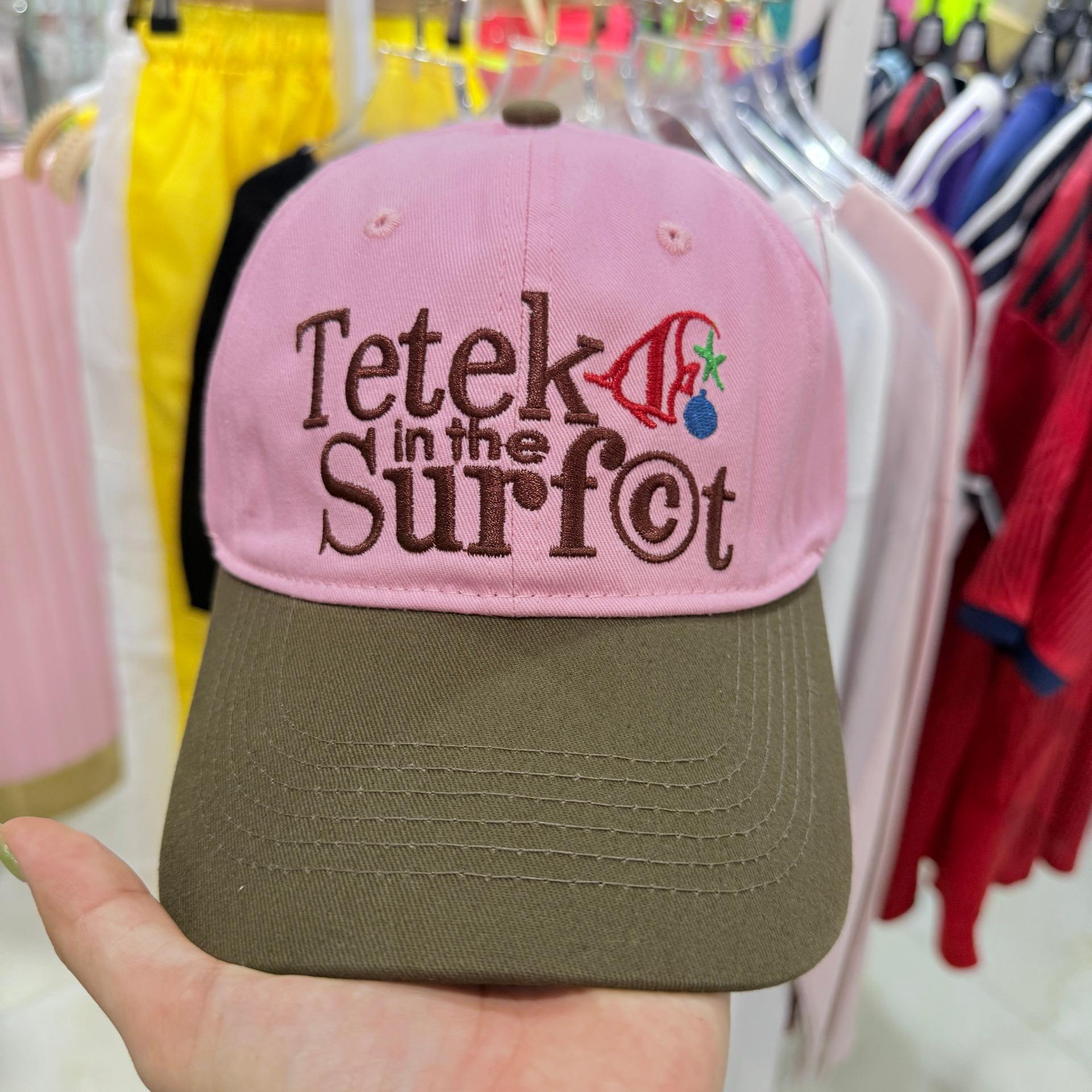 Tetek in the Surfct cap