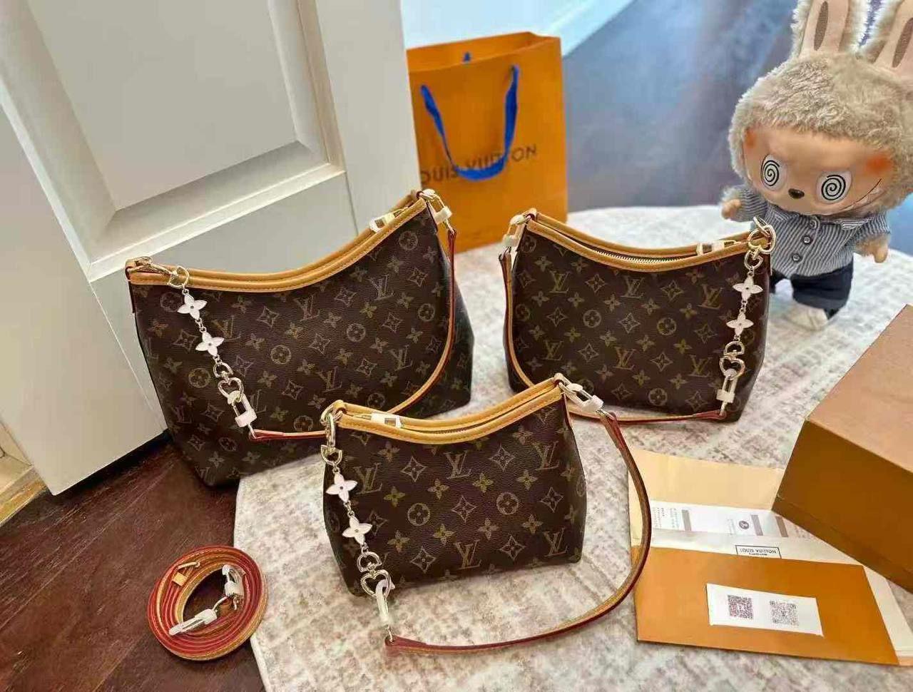 កាបូបម៉ាក”LV”