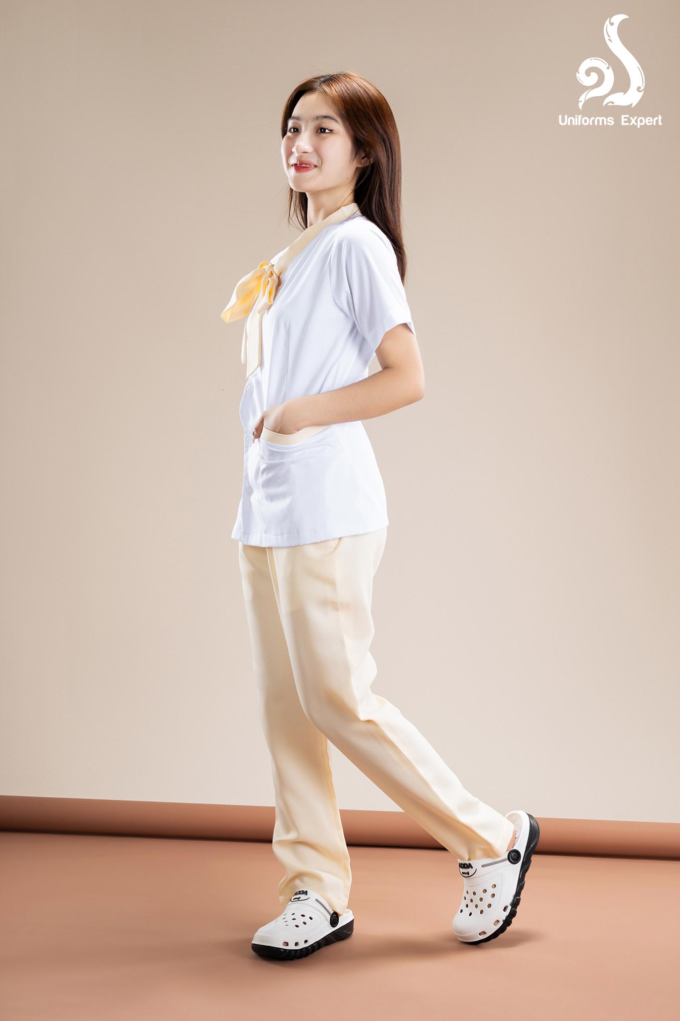VIP ឈុតនារីពណ៌ស លឿង ចងបូរ -  VIP Nurse set for women Yellow and white